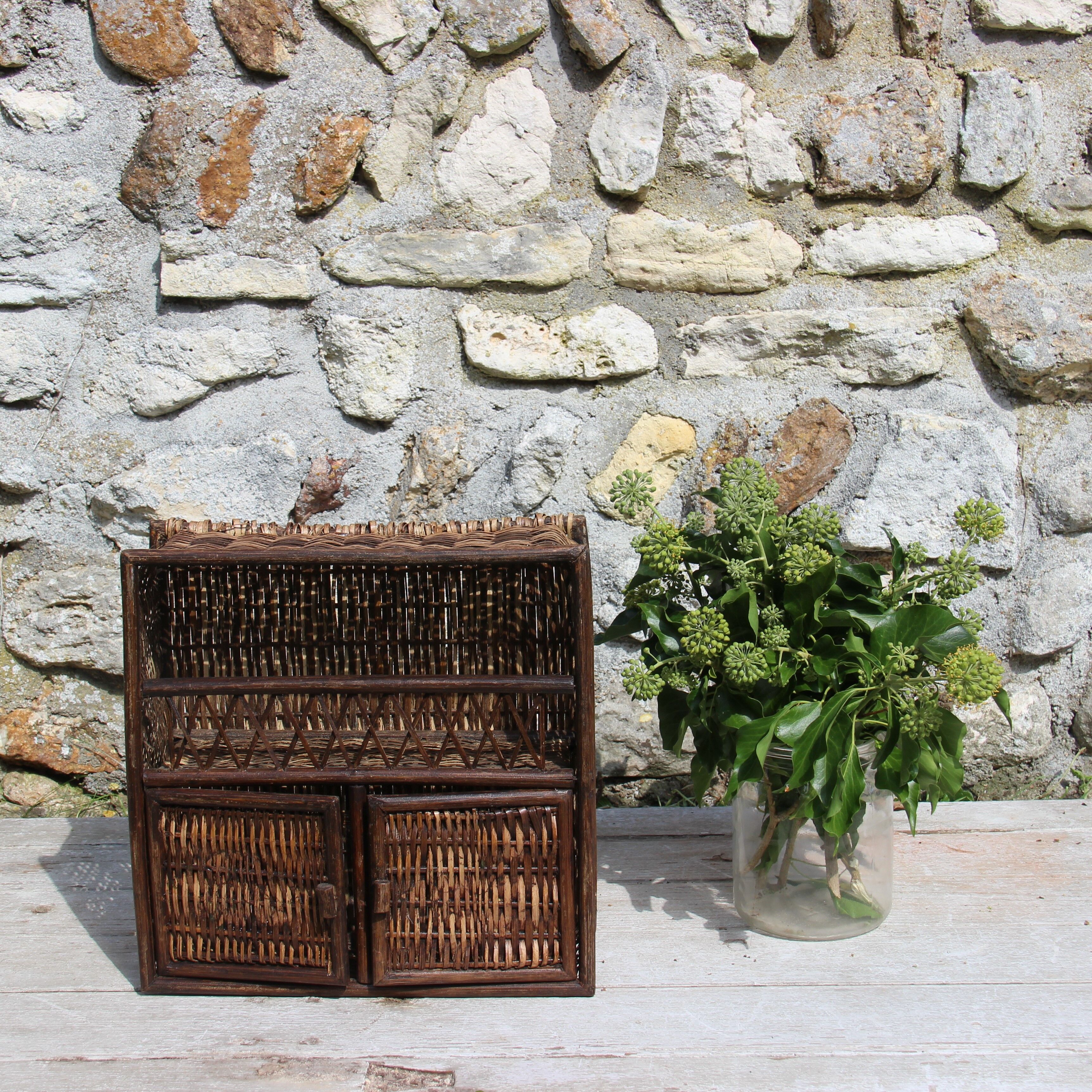 Doll cabinet in rattan and wood