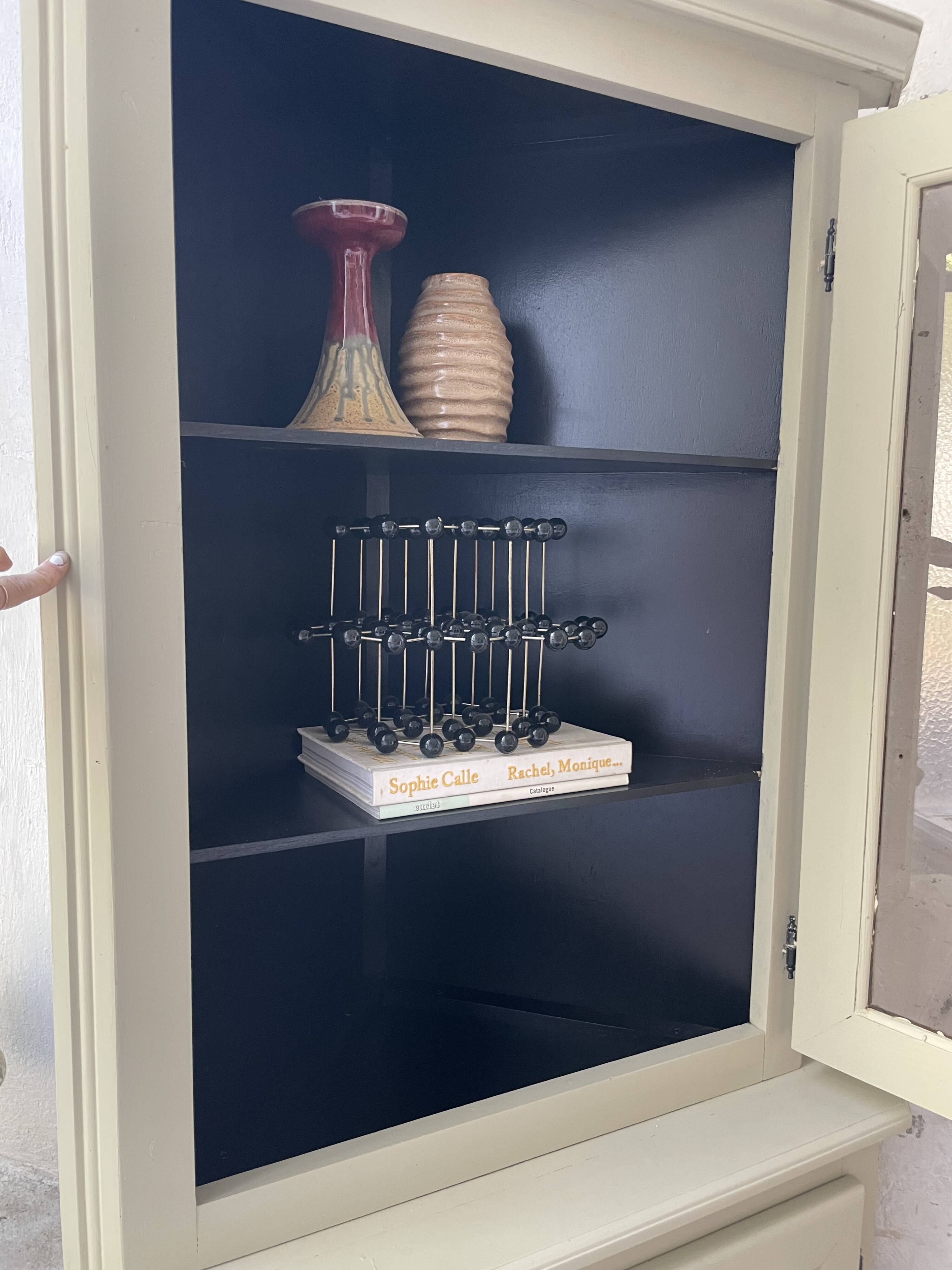Corner display cabinet from the 1950s