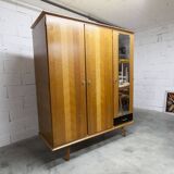 French wardrobe with tapered legs, 3 doors, 1 mirror (27*130), and 1 drawer.