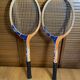 Pair of vintage wooden tennis rackets for cadet junior sport courier