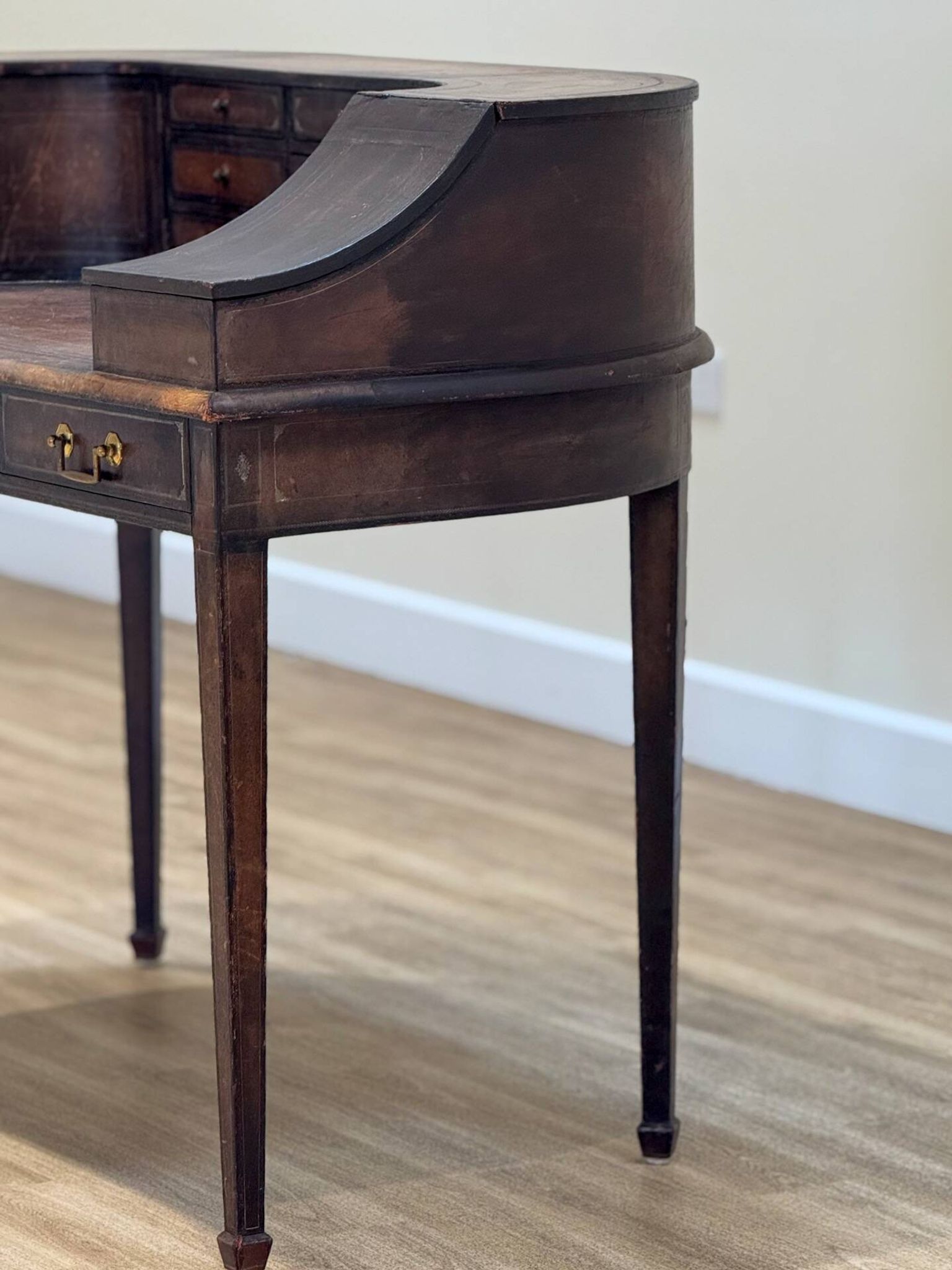 Antique desk by Charles Lowe & Sons