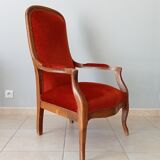 Walnut and velvet voltaire armchair