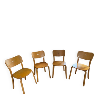 Set of 4 light wood chairs from the 1960s.