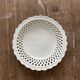 Openwork, woven earthenware plate