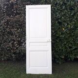 Communication door H220xW80.5cm, old panelled with moulding.