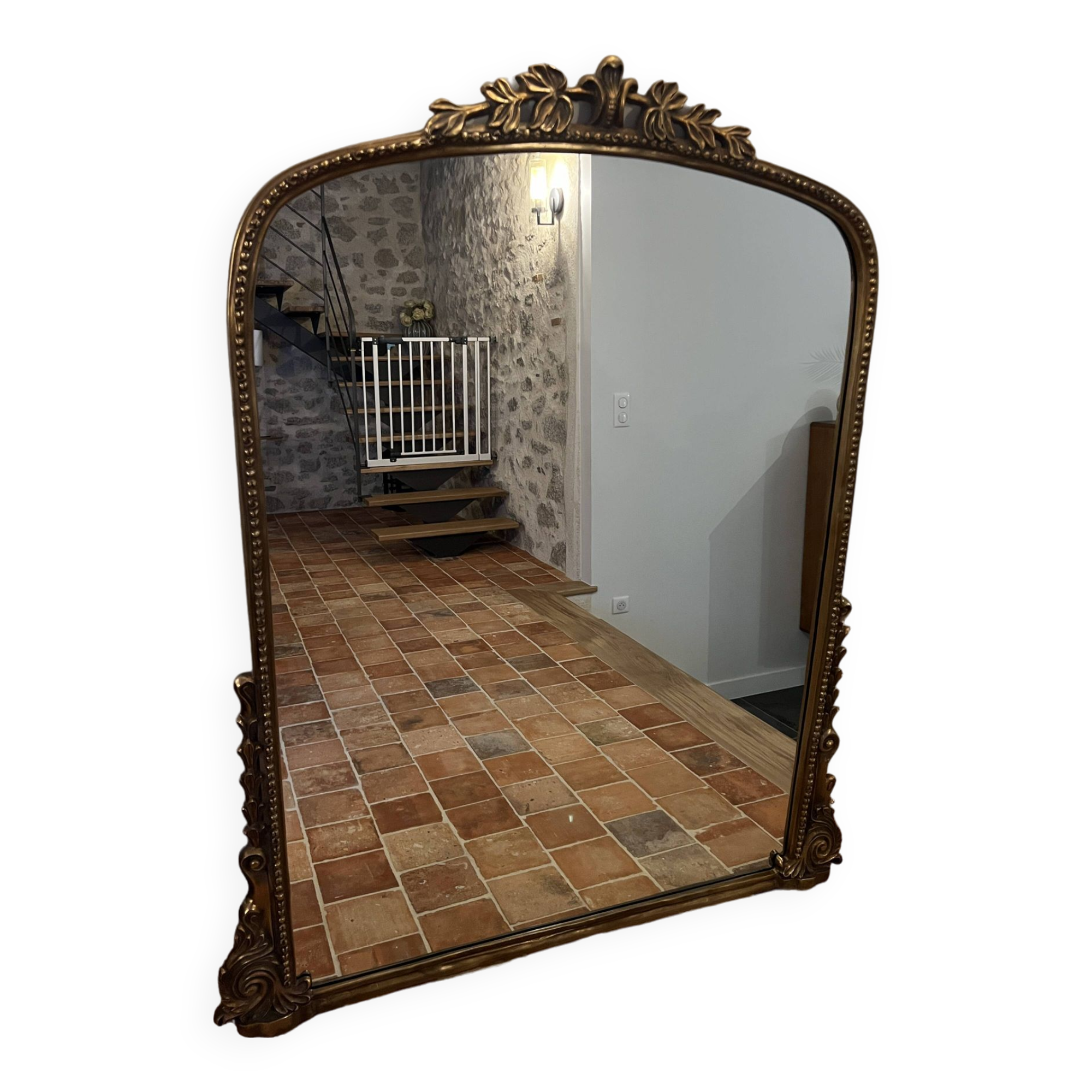 Large gilded mirror with pediment