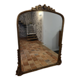 Large gilded mirror with pediment