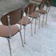 4 brown formica kitchen chairs with wood effect
