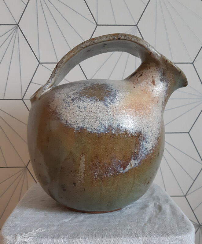 Original round earthenware jug.