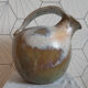 Original round earthenware jug.