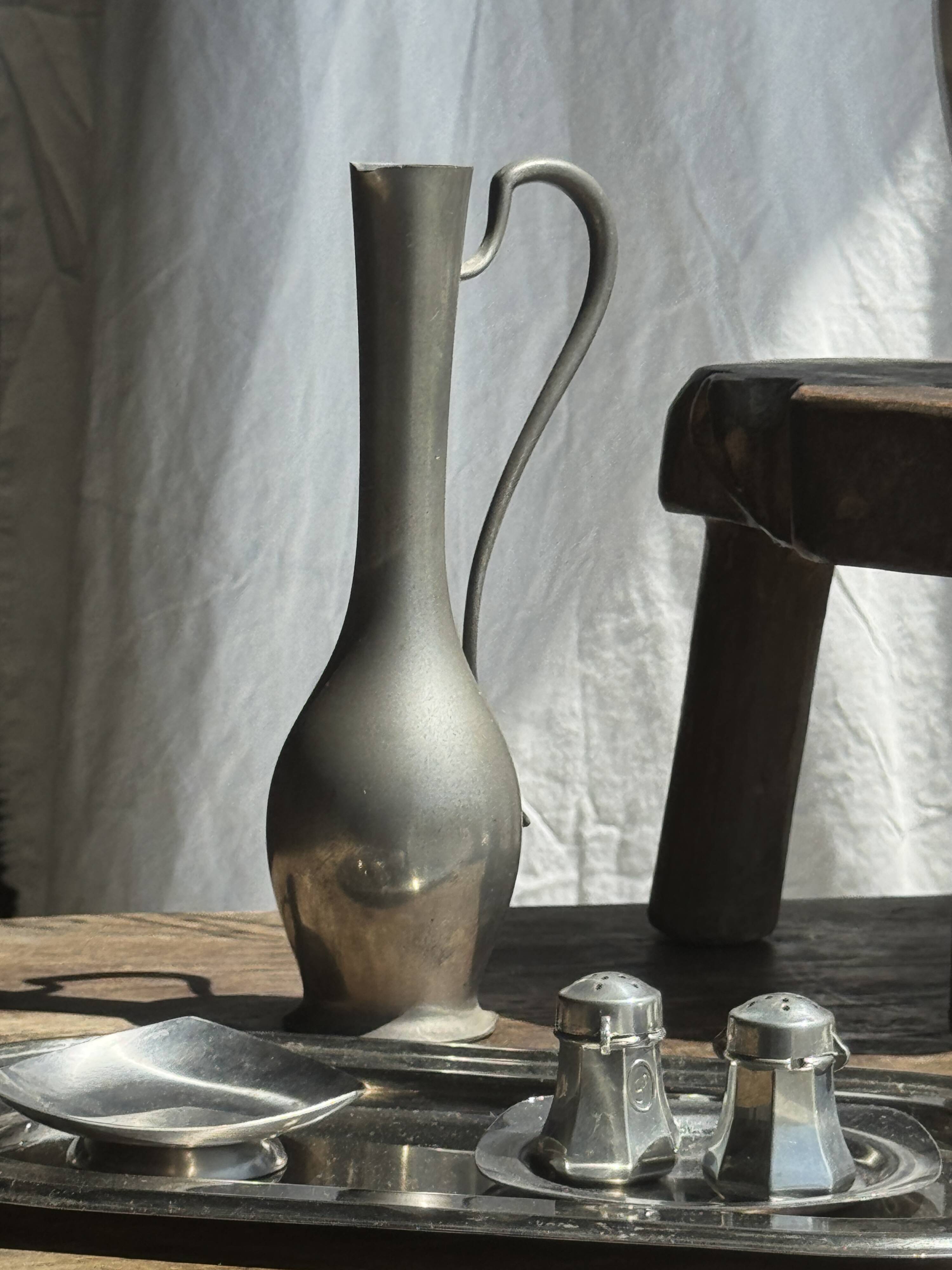 Small 19th century pewter jug, 95% hallmark H20.5