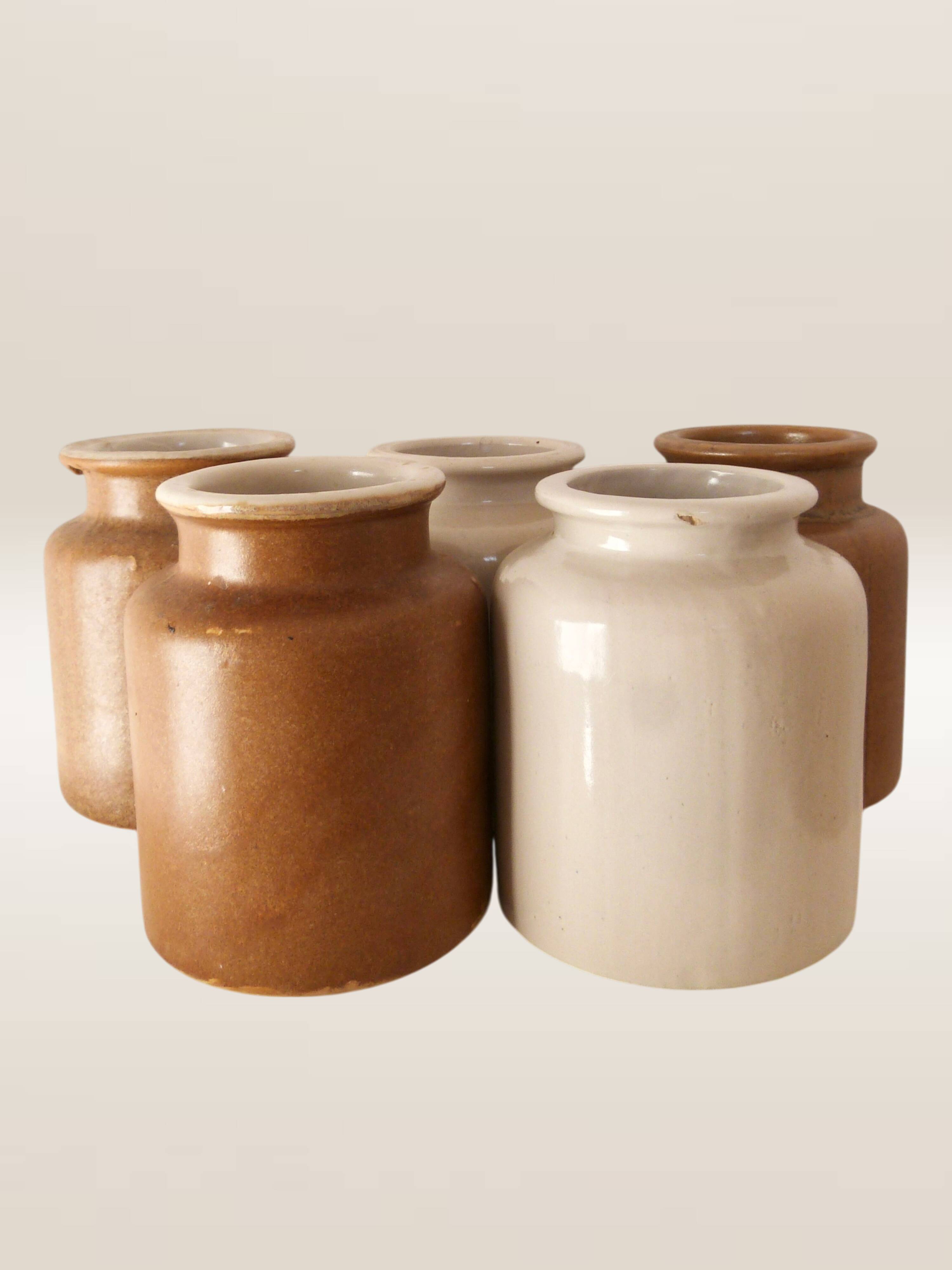 Set of five stoneware mustard pots