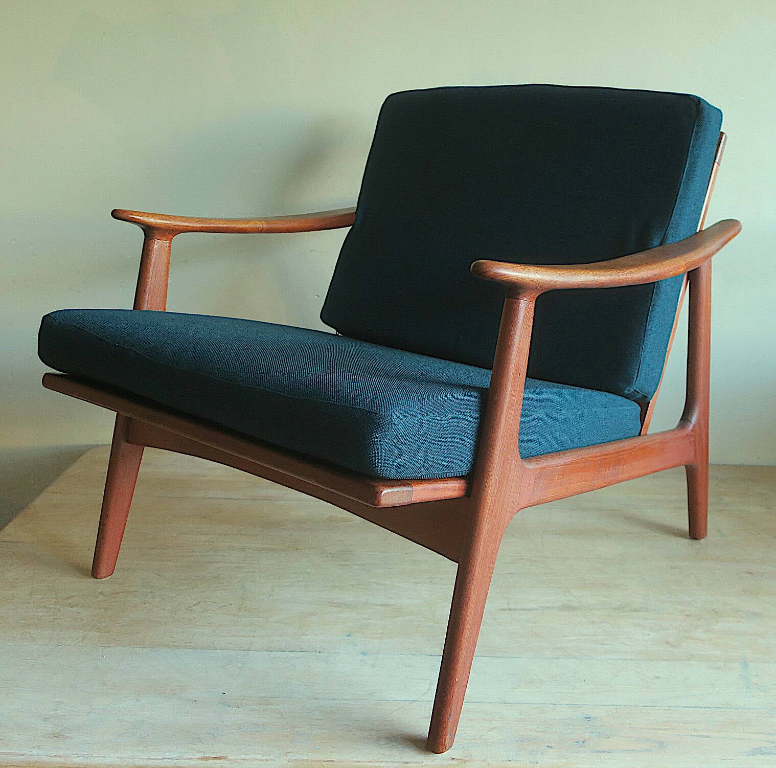 Danish teak lounge chair with blue-green cushions, 1960s