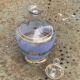 Blue granite glass carafe with vintage gold trim.