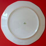 Suite of eighteen plates (18) of flat table in Limoges porcelain with floral decoration