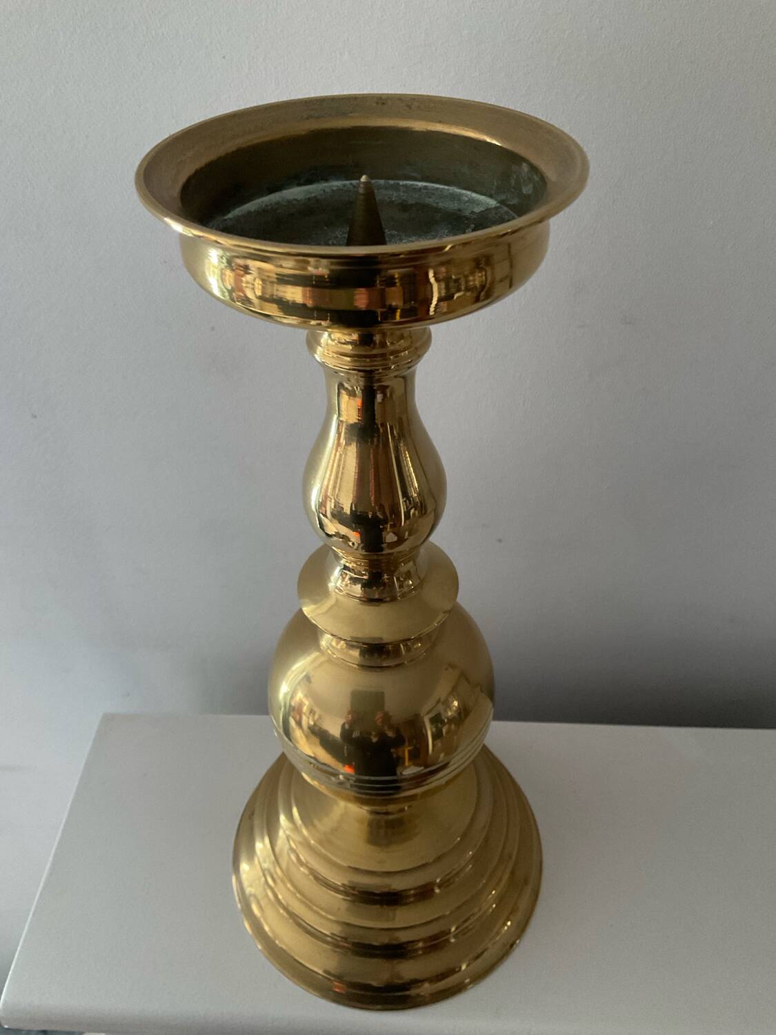 Antique candle holder in solid bronze