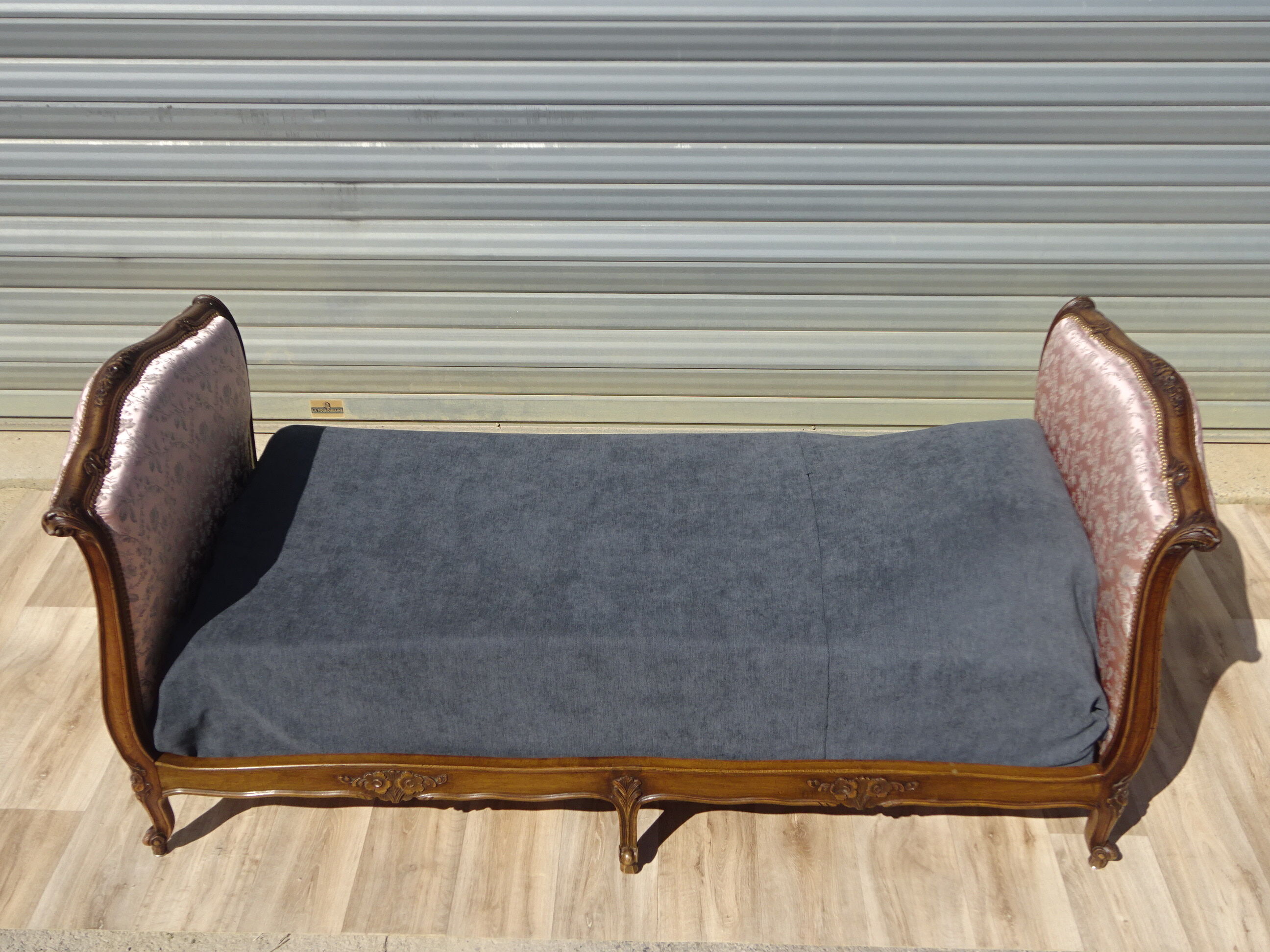 Antique sofa bed, in Louis XV style.