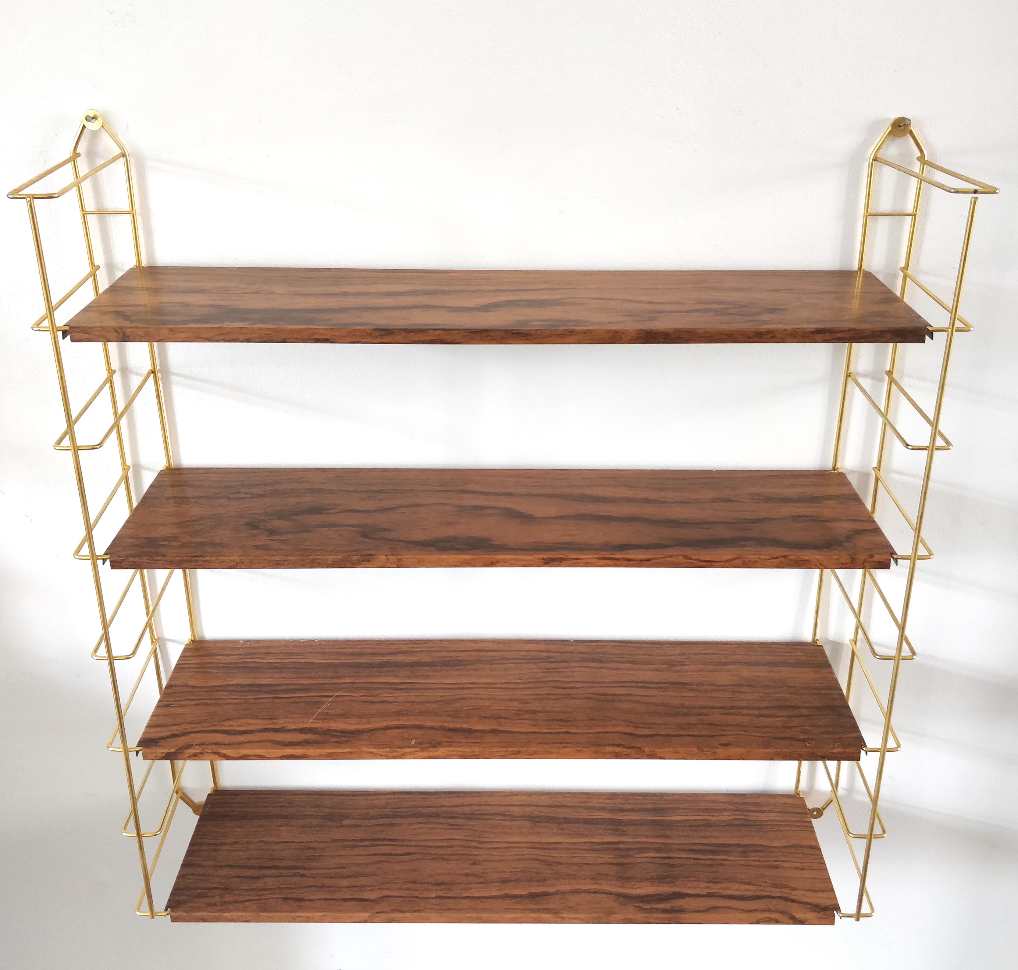 Wood-coloured metal string shelf and gold double studs 1960