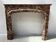 Louis XIV style fireplace in speckled red marble, 19th century.