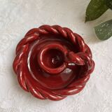 Twisted red earthenware candle holder - in the style of St Clément