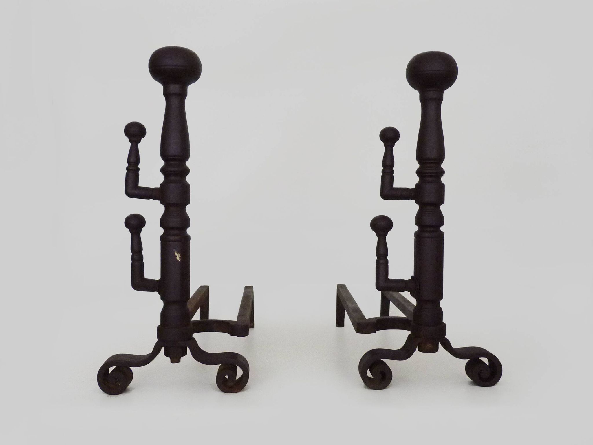 Large pair of wrought iron fireplace andirons. France, 19th century.