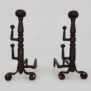 Large pair of wrought iron fireplace andirons. France, 19th century.