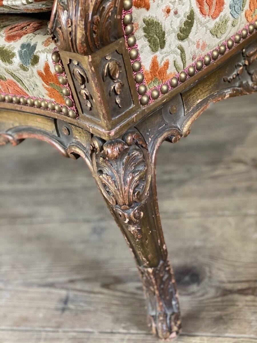 Regency style armchair in gilded wood