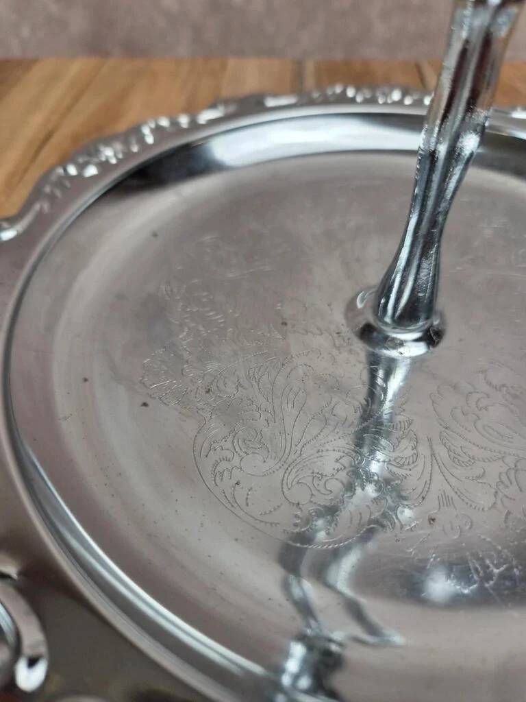 Small vintage round display stand in chrome metal – rococo style