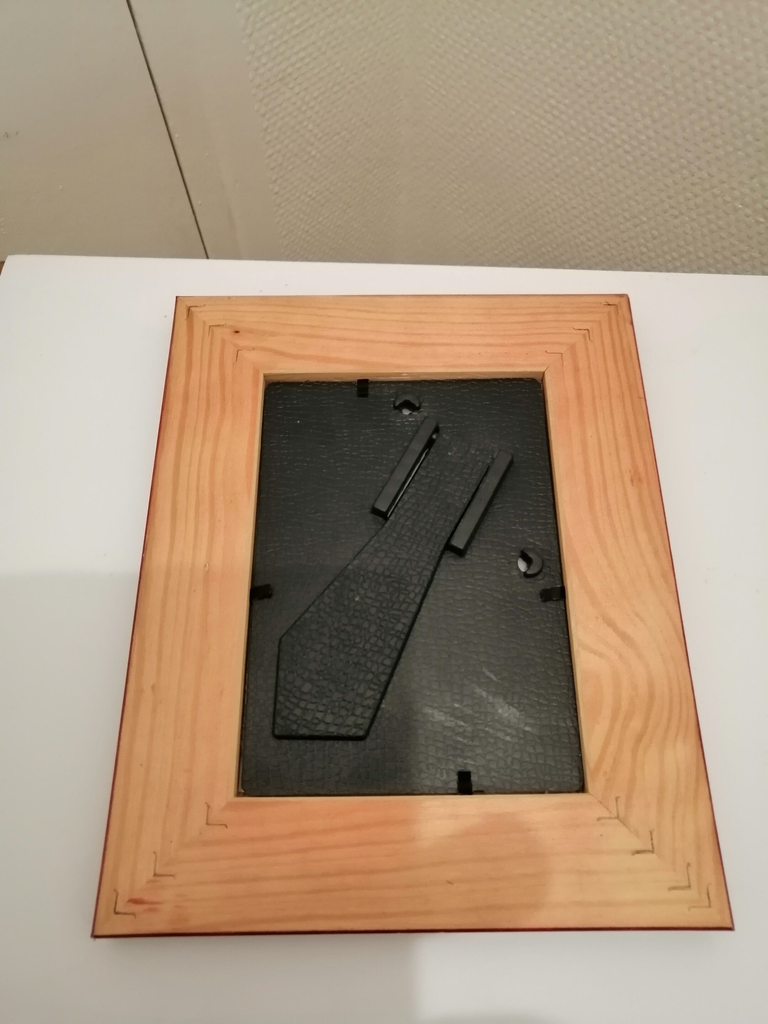 Carved wooden wall frame