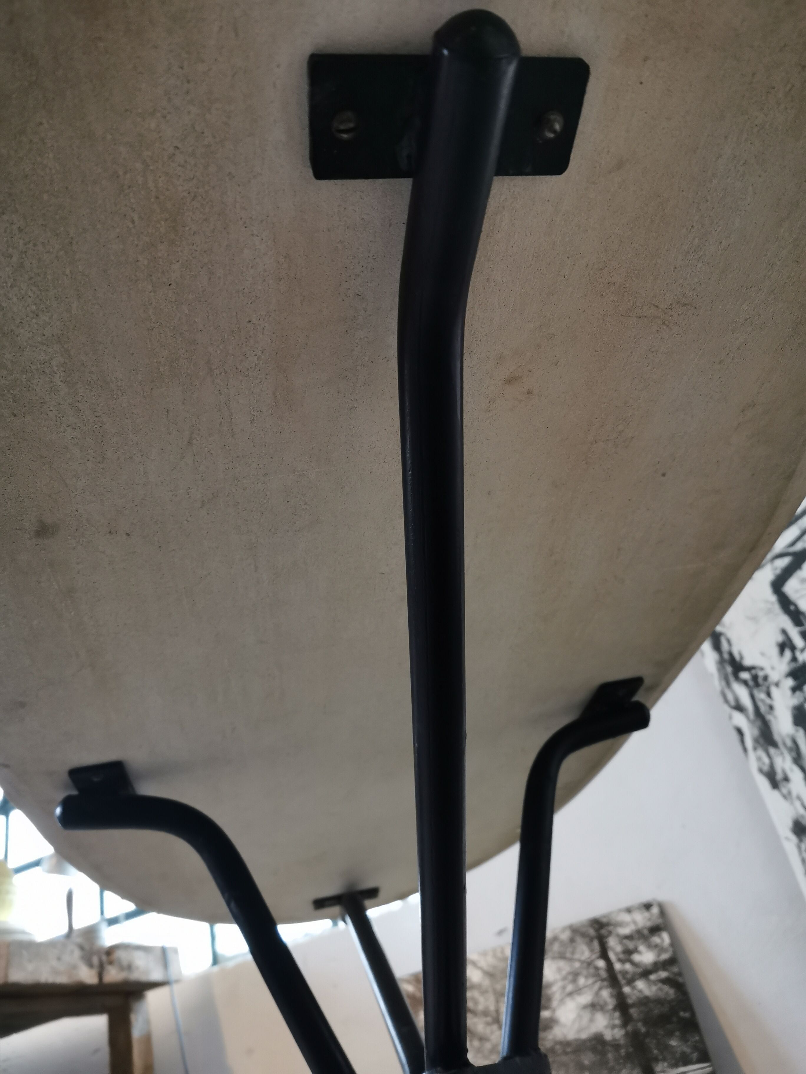 Large oval coffee table in travertine and metal