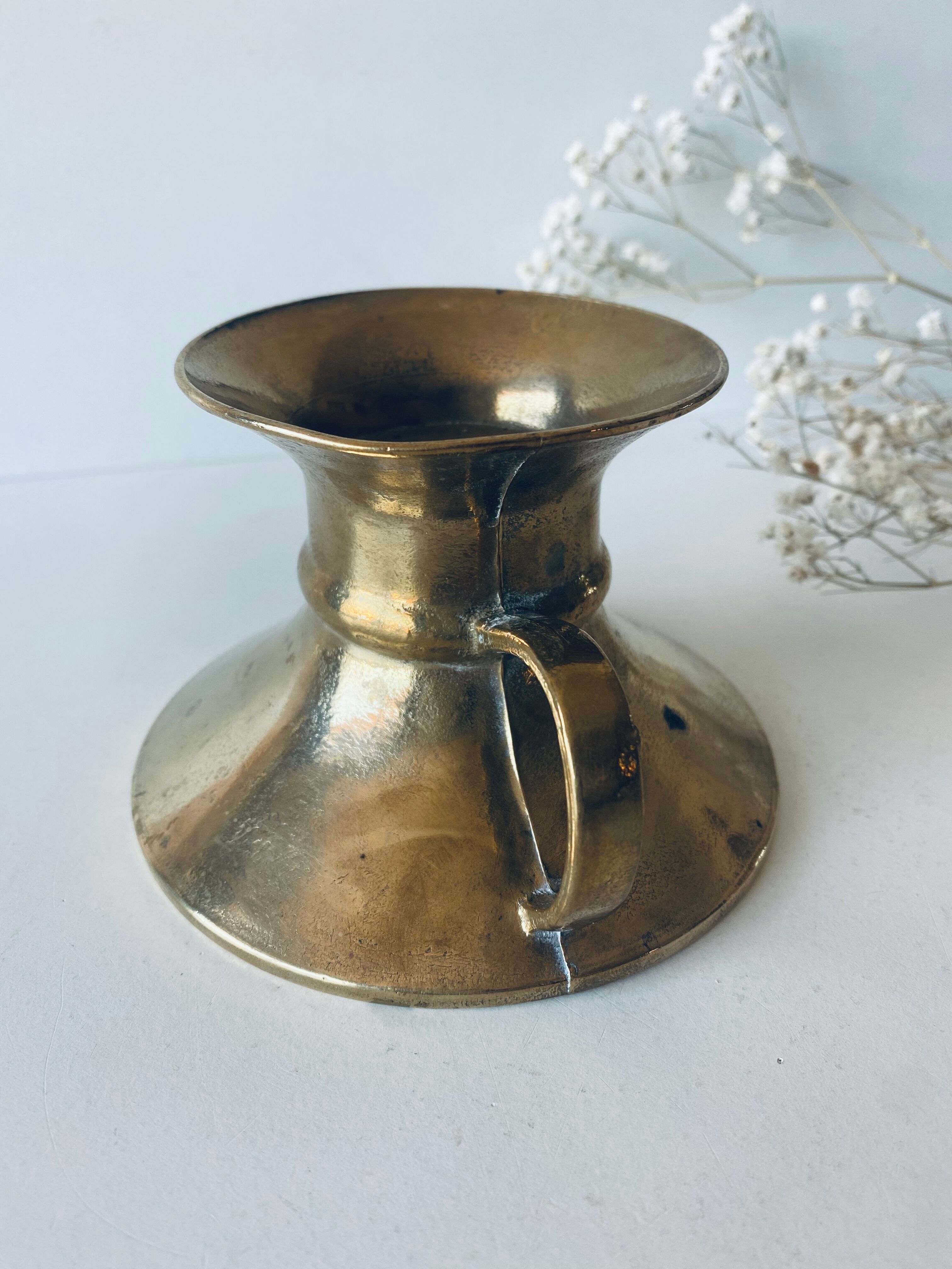Old bronze church candle holder