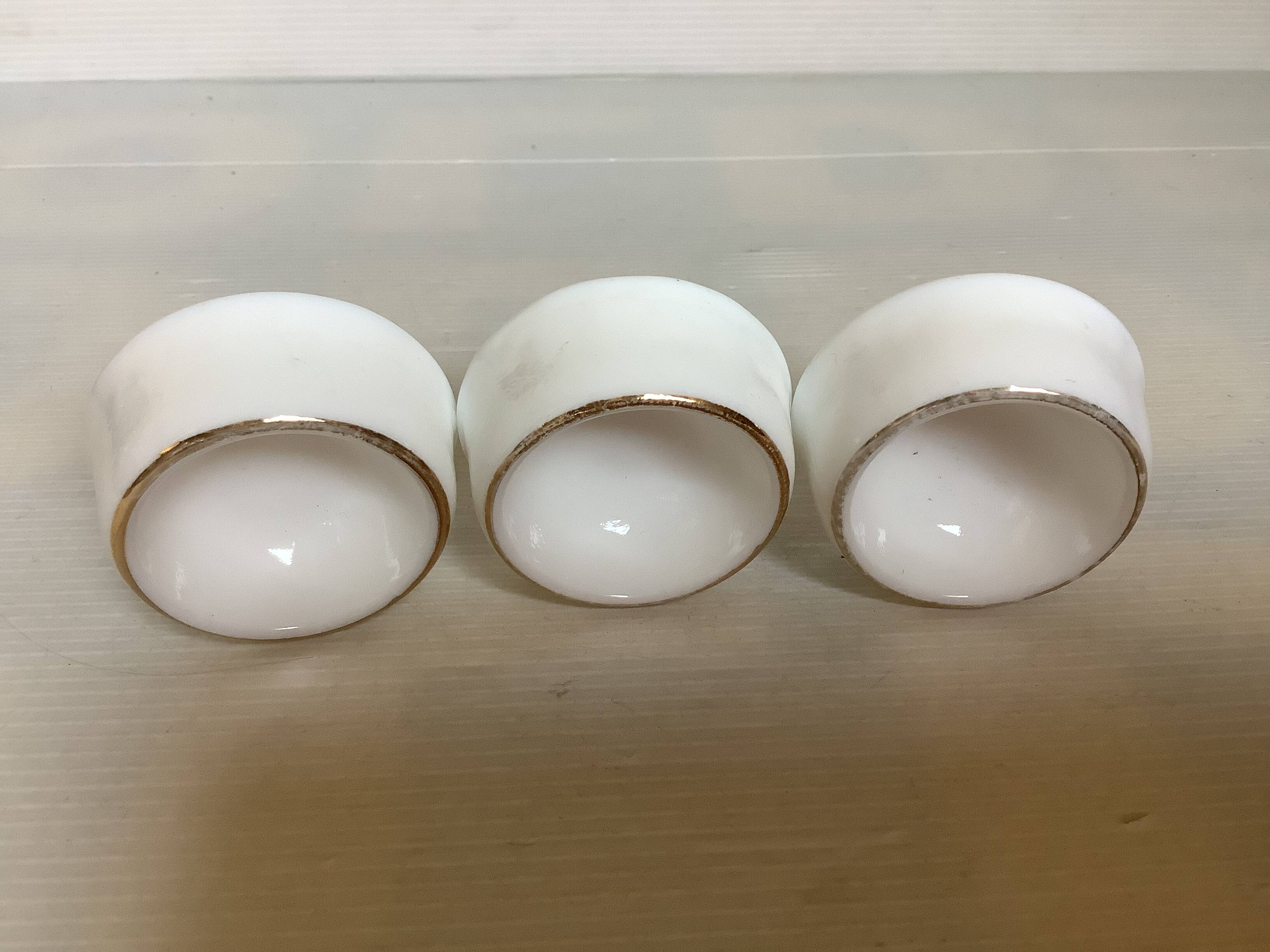 Set of three opaline egg cups