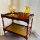 Vintage wooden and gilded brass rolling dessert trolley