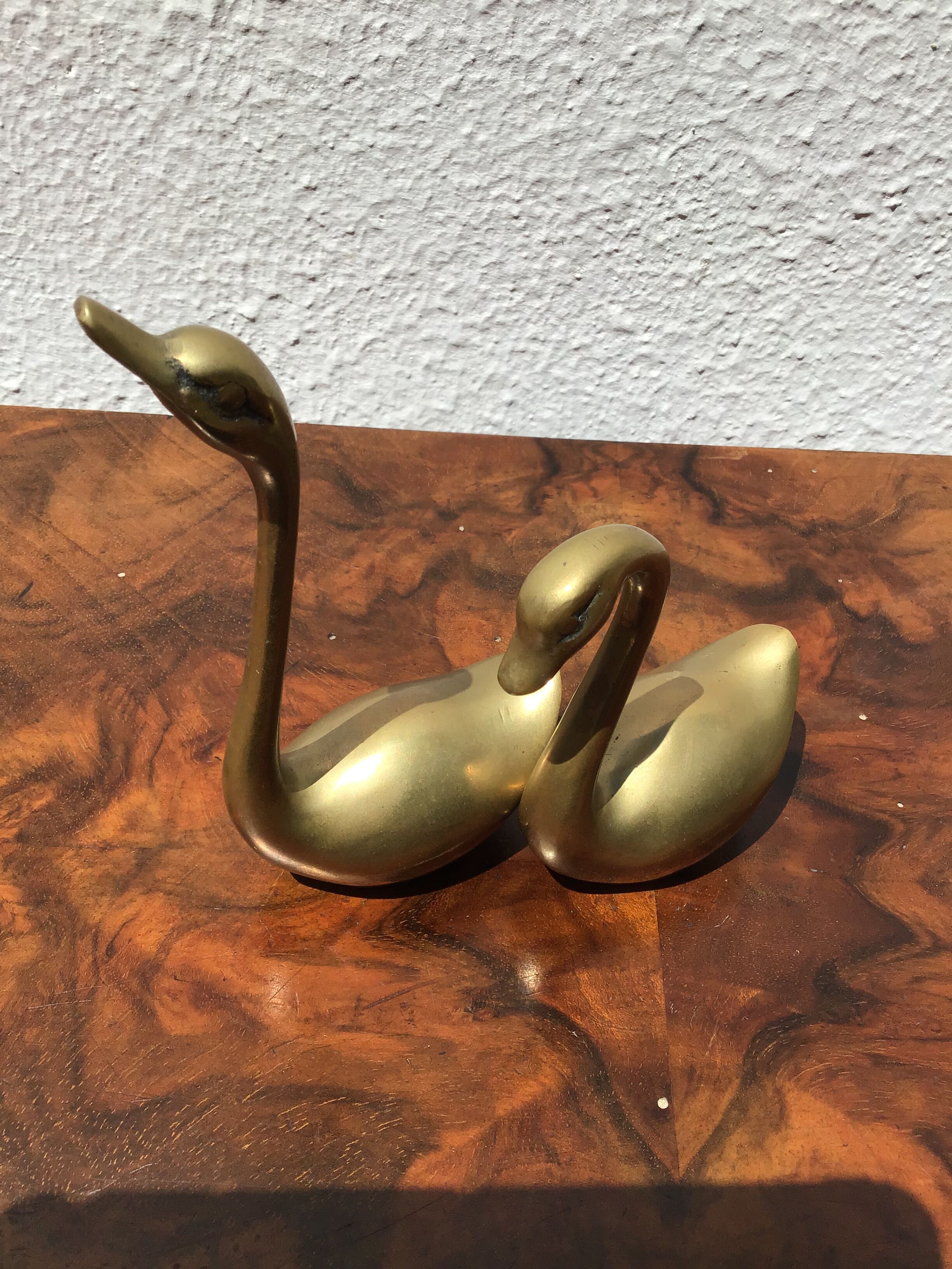 Pair of brass swans
