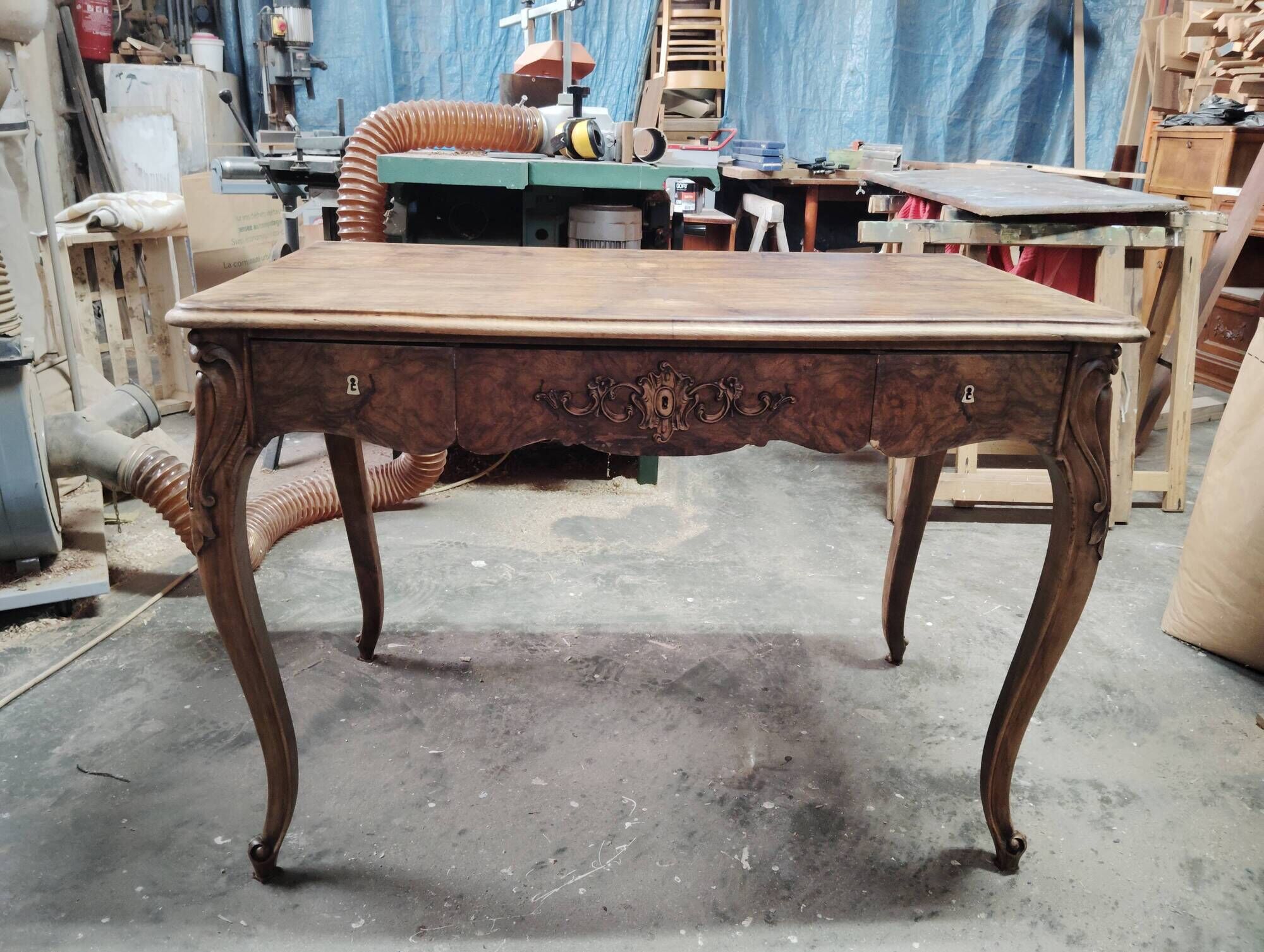 Louis XV desk with walnut burl.
