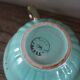 Green and gold cup from the Moi Salins collection.
