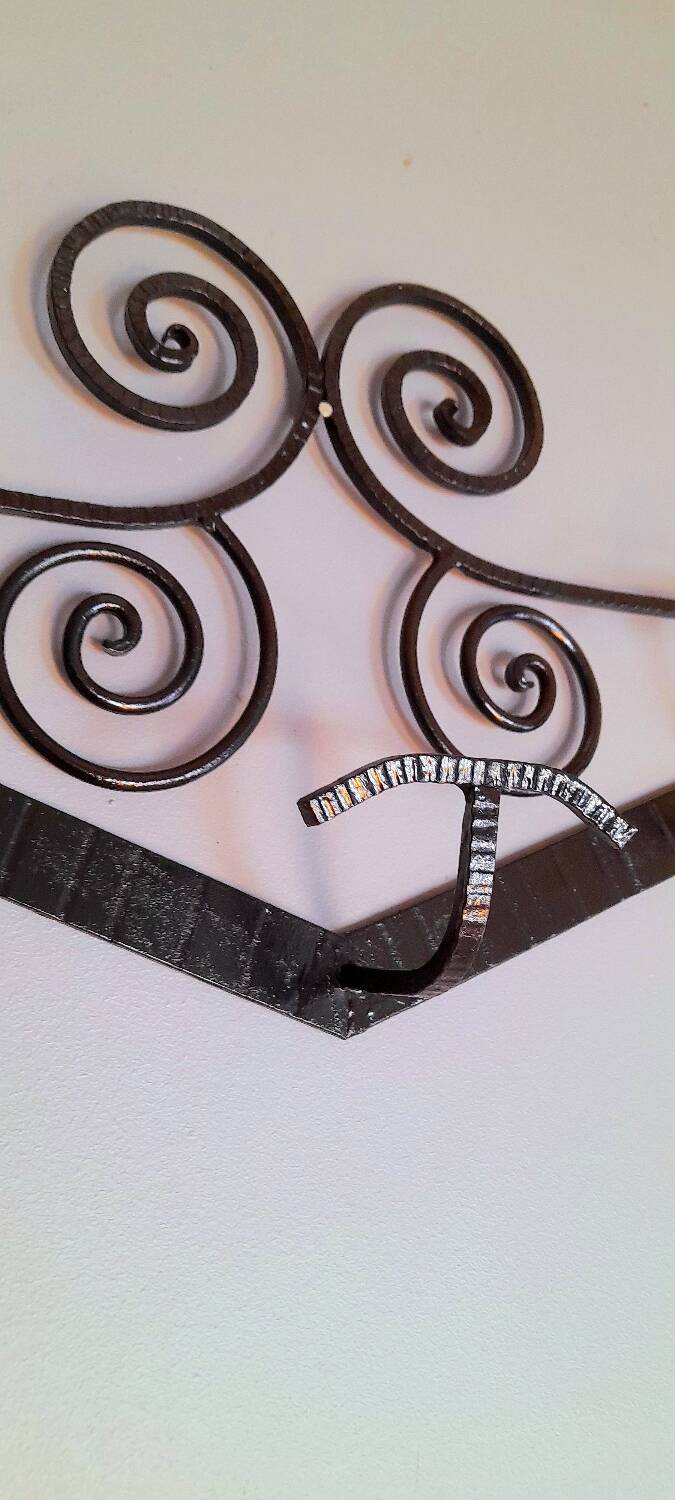 Art Deco wrought iron coat rack.