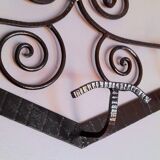 Art Deco wrought iron coat rack.