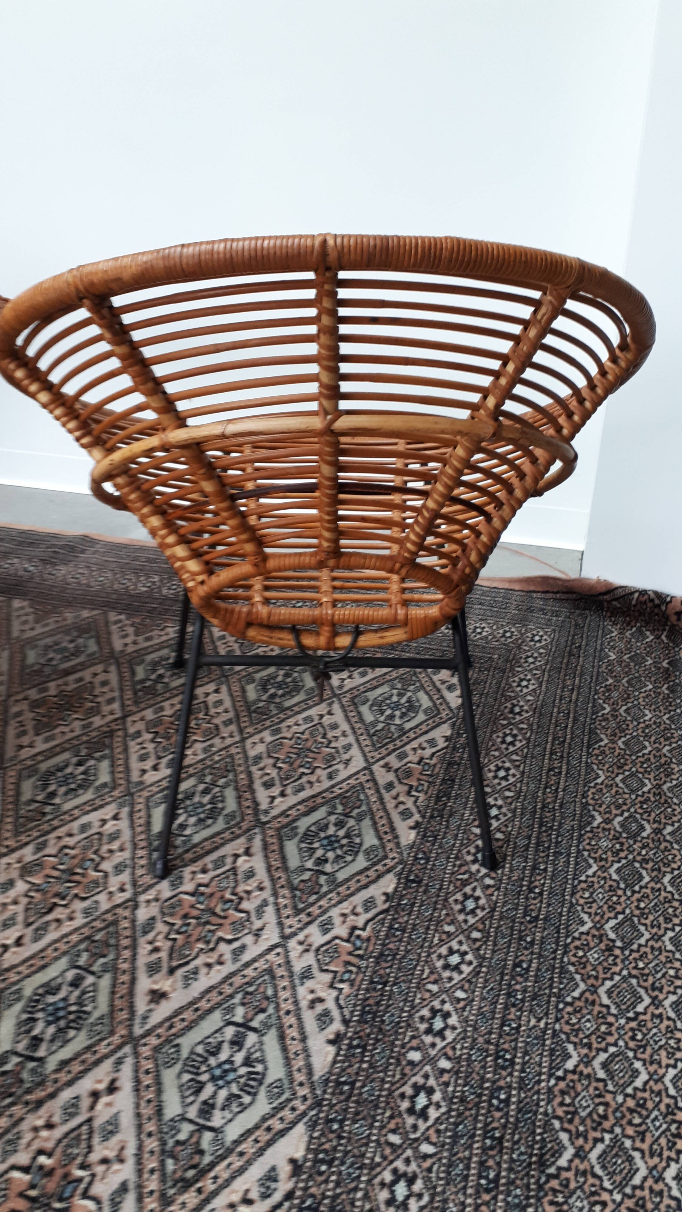 Set of armchairs "soleil" and rattan table of the years 50