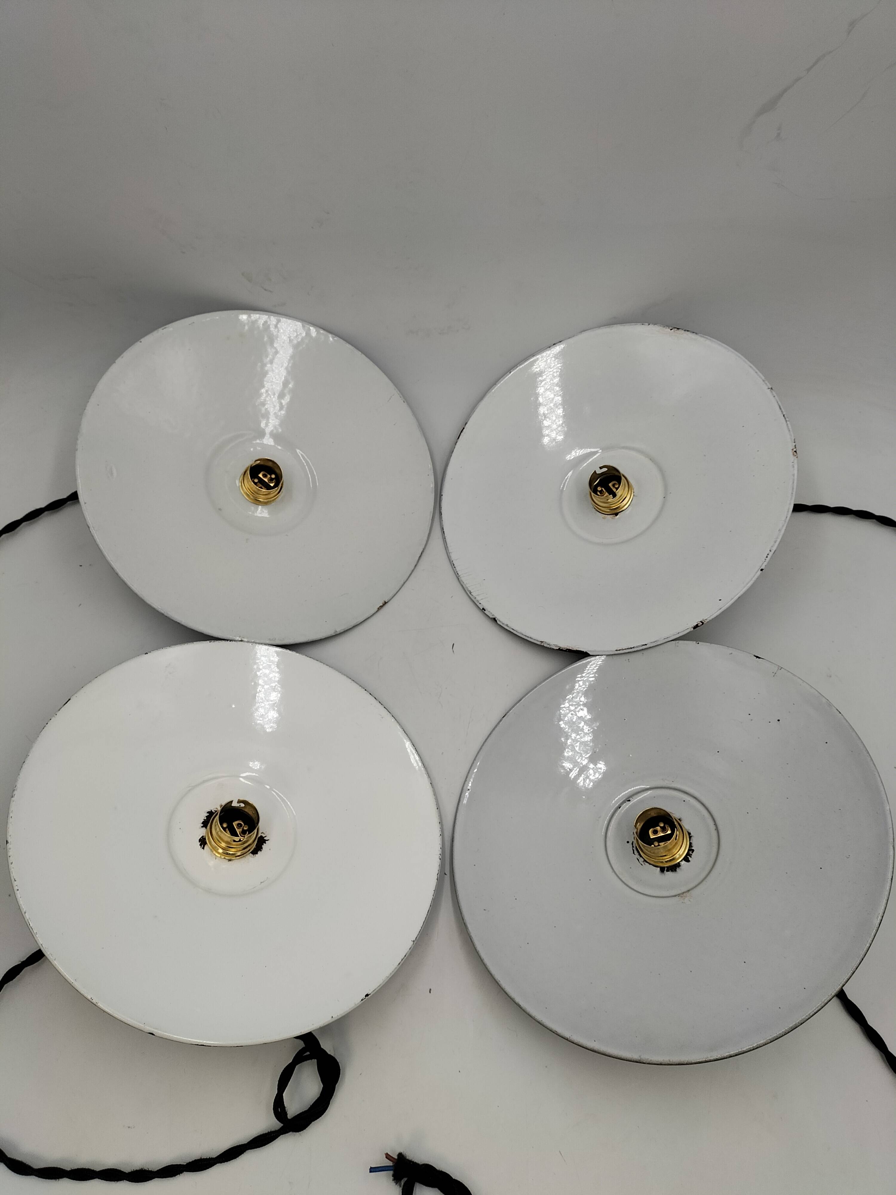 4 enameled sheet metal pendants