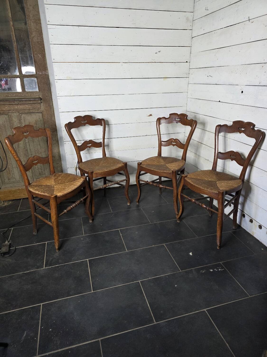 4 old straw chairs