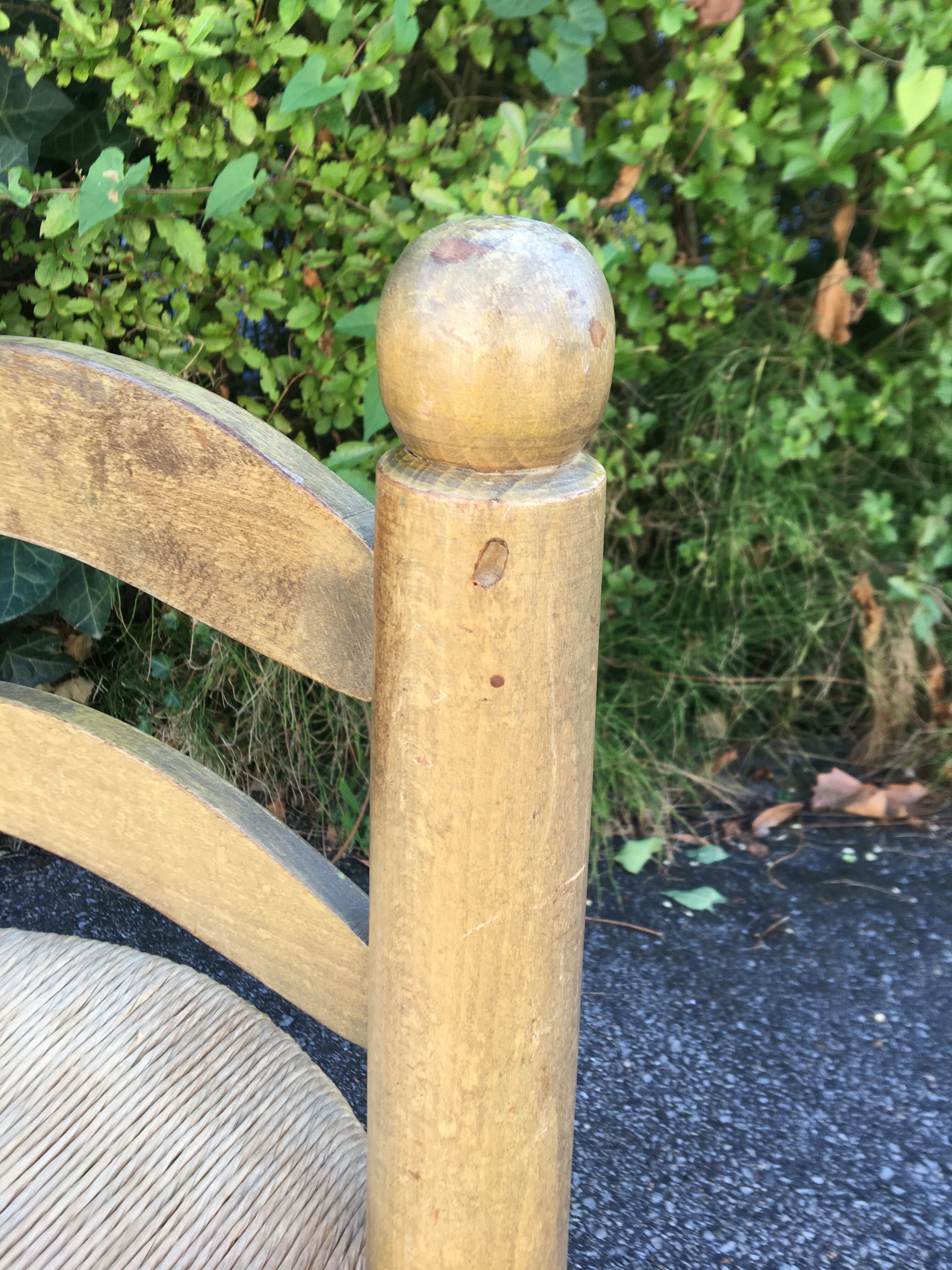 Low wooden chair and straw 50s