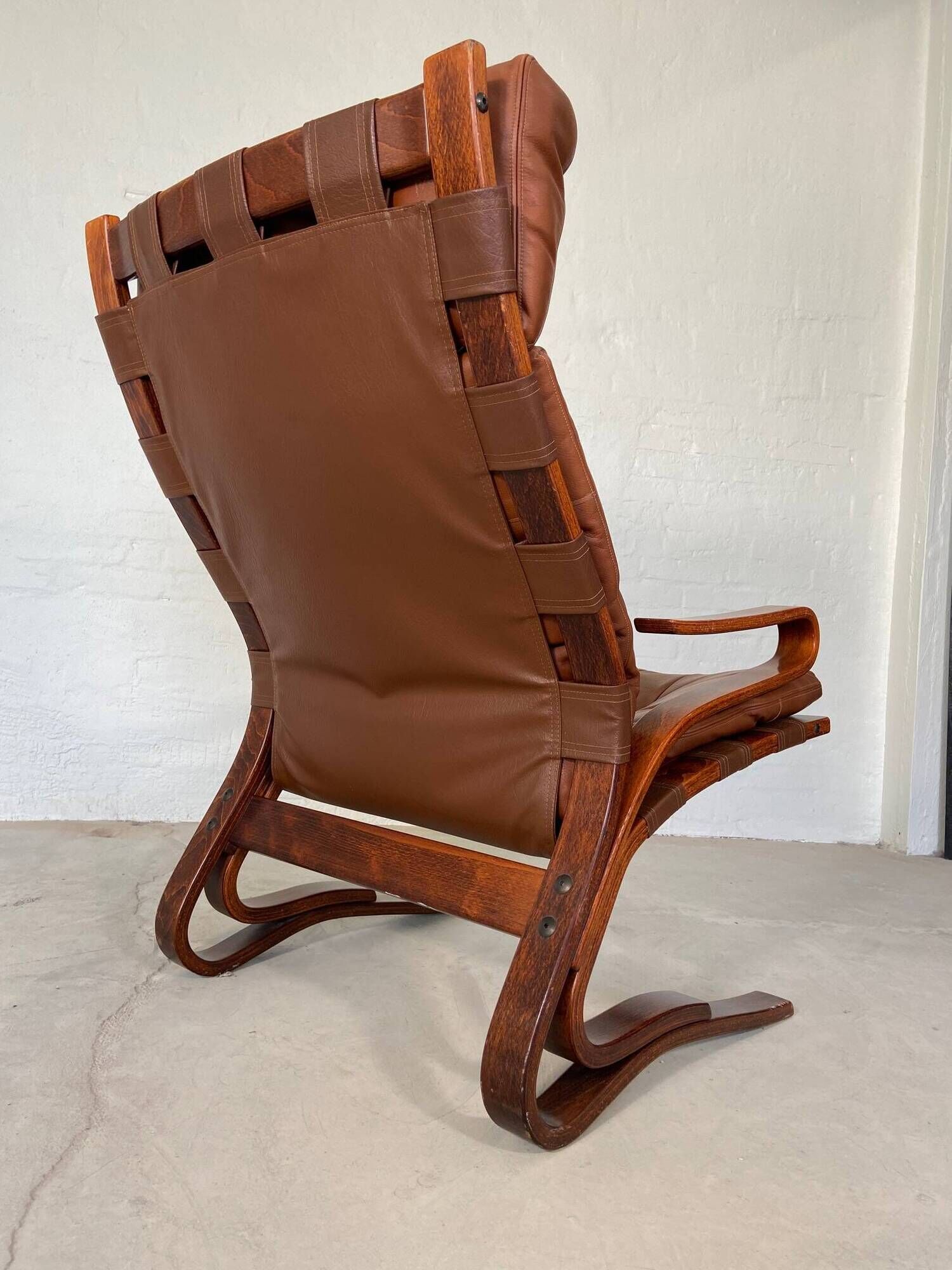 Vintage scandinavian cognac lounge chair by oddvin rykken 1960s