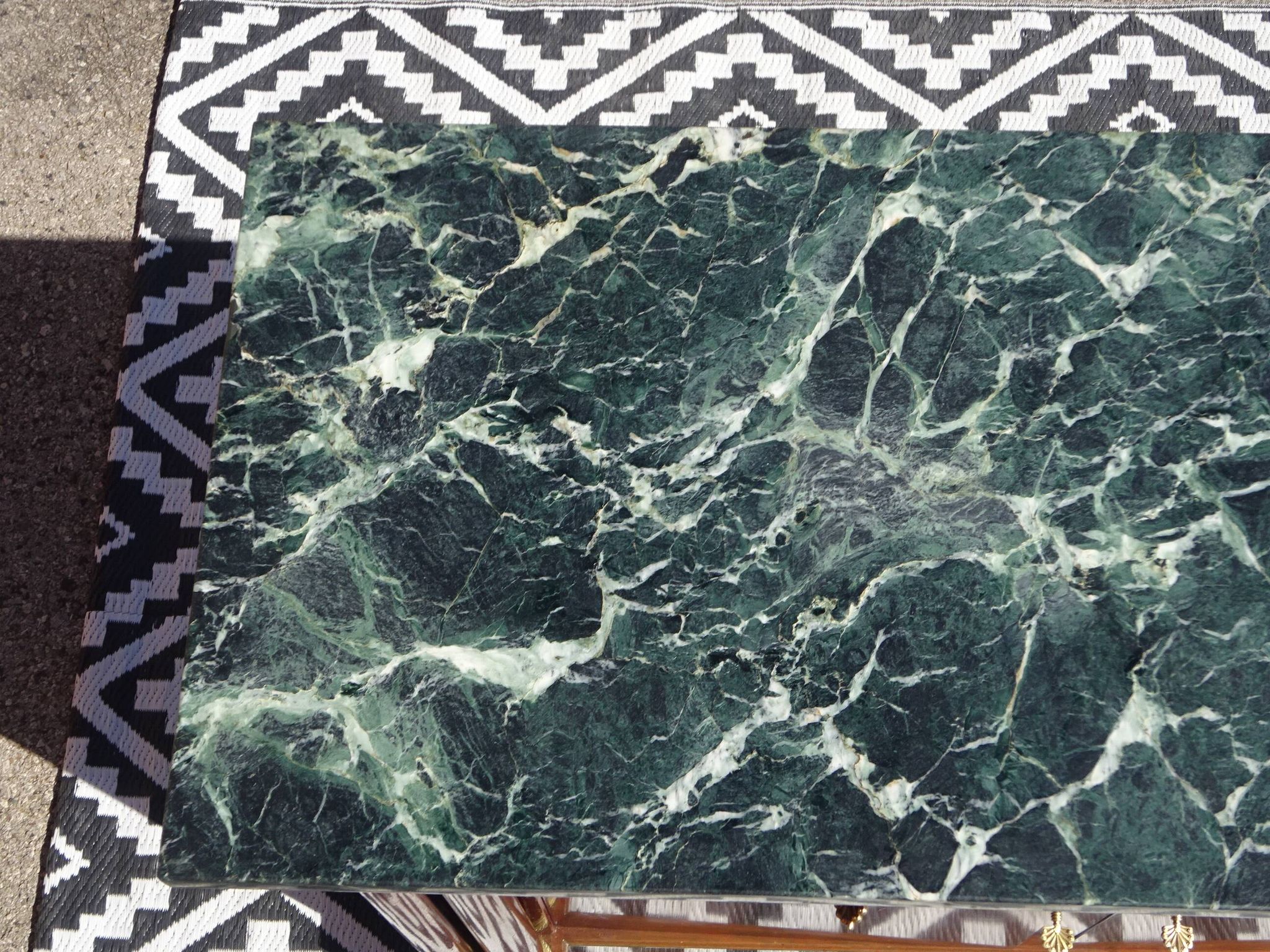 Flamed mahogany enfilade with sea green marble in Empire style.