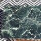 Flamed mahogany enfilade with sea green marble in Empire style.