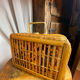 Wicker and wood suitcase