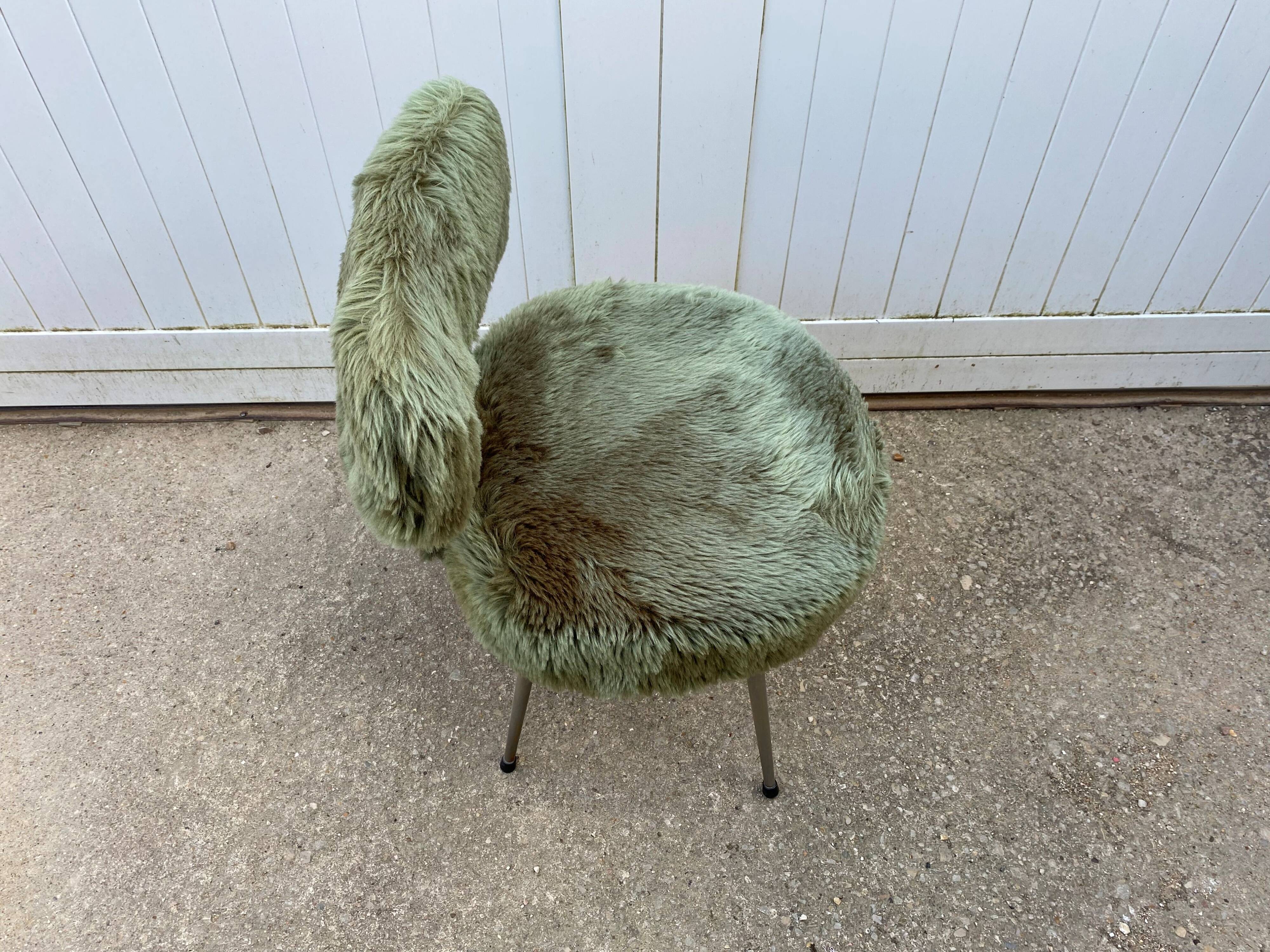 Vintage green furry chair from the 1960s