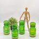 Series of 4 vintage green glass jars, Belgium,