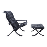Westnofa black leather Flex armchair with ottoman