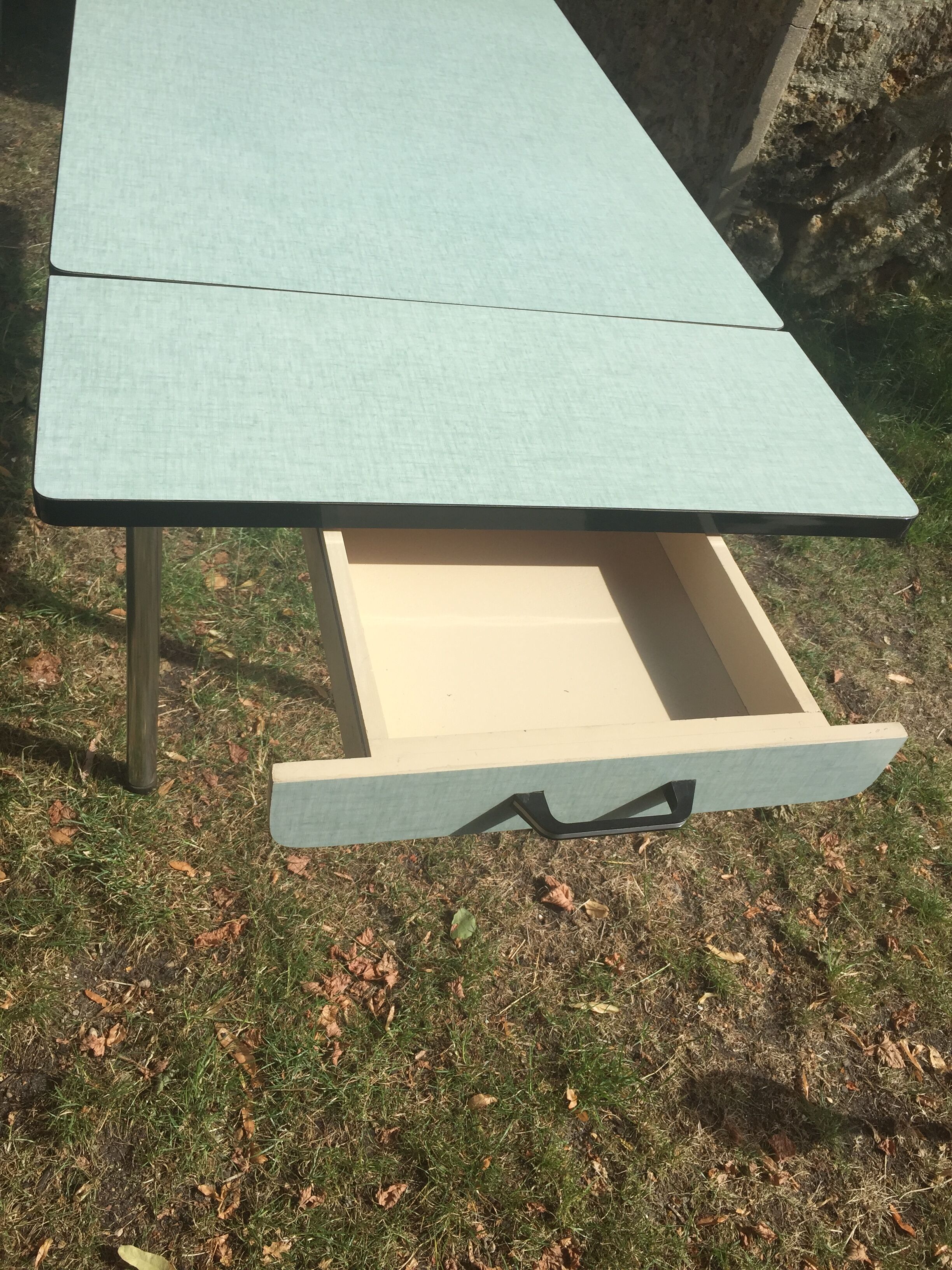 Table and 4 green water formica chairs 60's